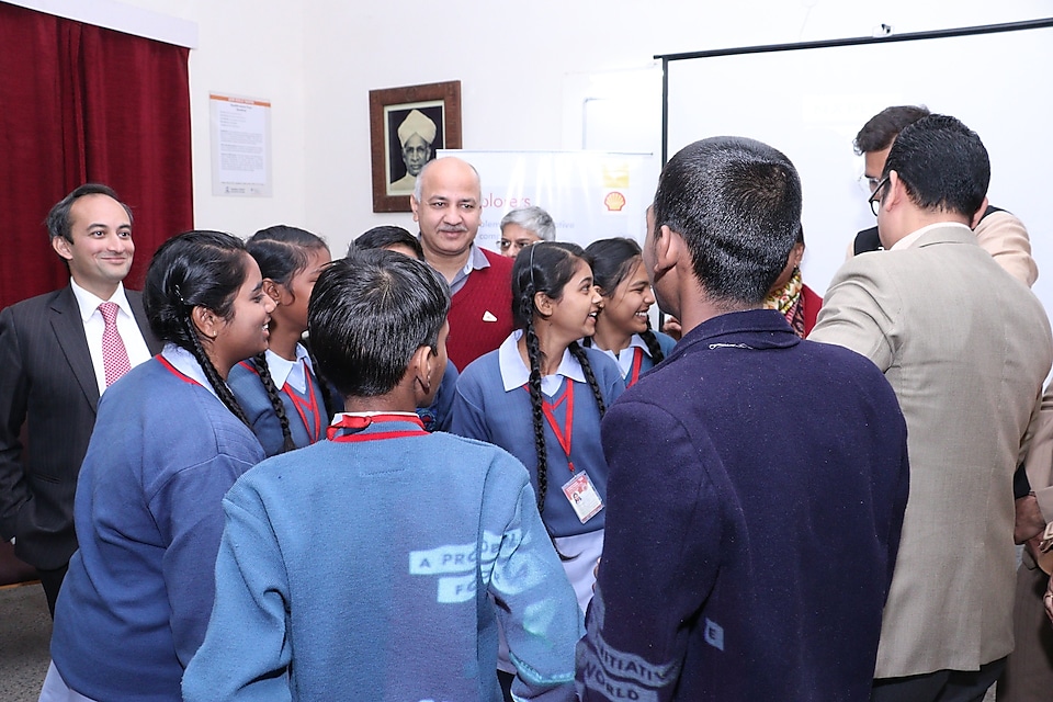 Delhi Deputy Chief Minister Manish Sisodia interacts with children about their NXplorer projects