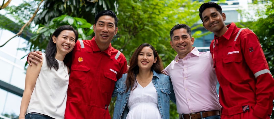 employees posing for a photo