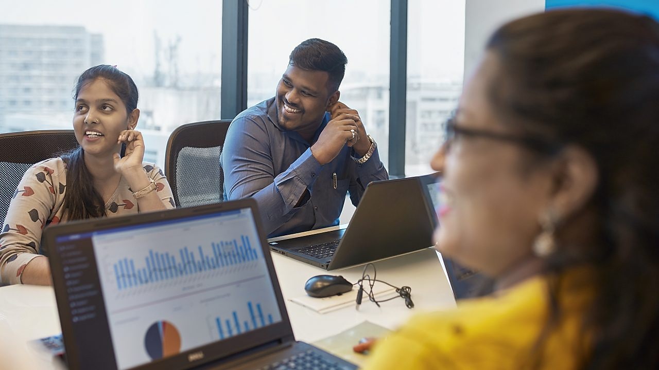 Smiling colleagues in a meeting