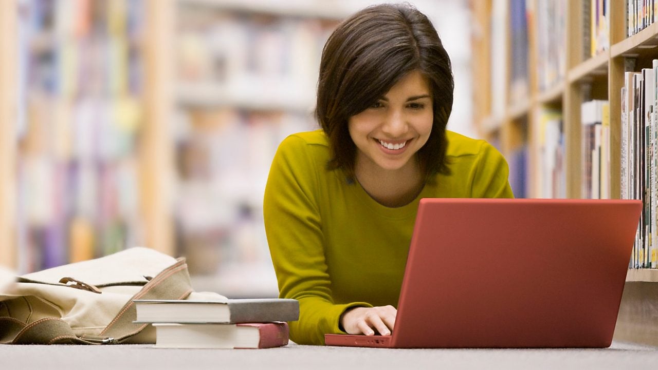 Woman looking at her laptop screen