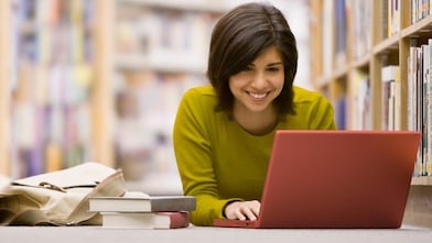 Woman looking at her laptop screen