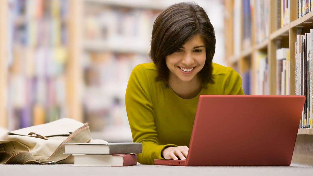 Woman looking at her laptop screen