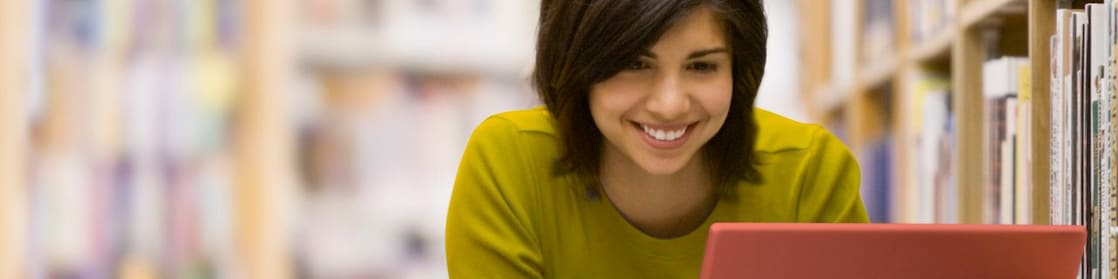 Woman looking at her laptop screen