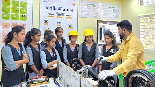 Batch of female students from Industrial Training Institute (ITI) getting hands on training on EV from a Skills4Future trainer.