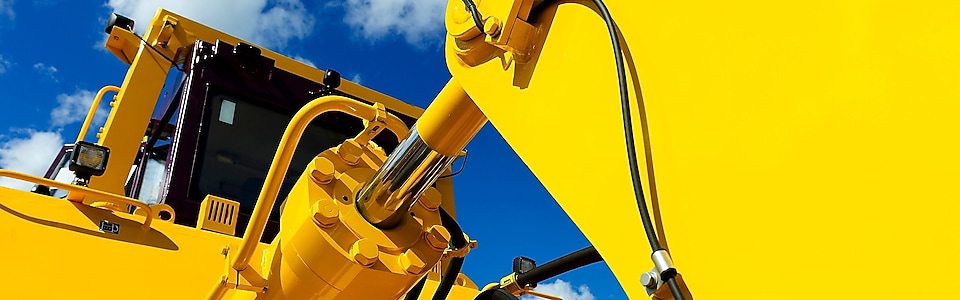 Close up on the hydraulic system of an excavator