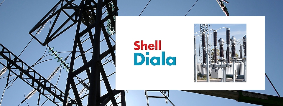 Pylon with a Transformer and the Shell Diala logo over it