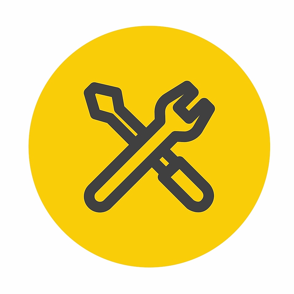 Icon of spanner on top of screwdriver