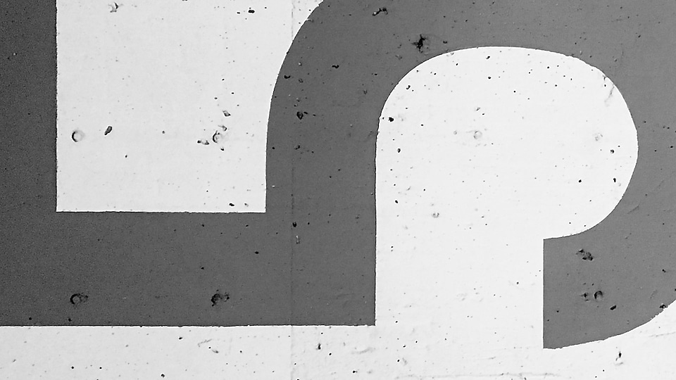 Number Five on a grey background