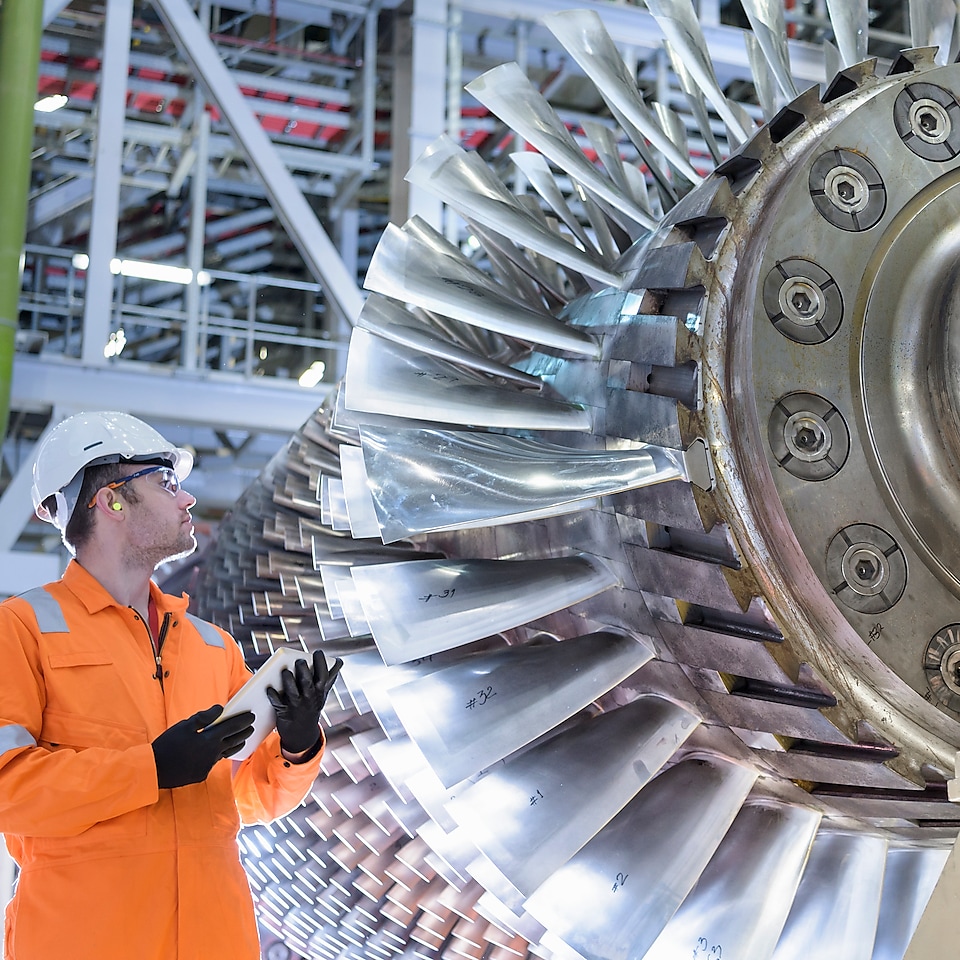 Engineer checking on a turbine