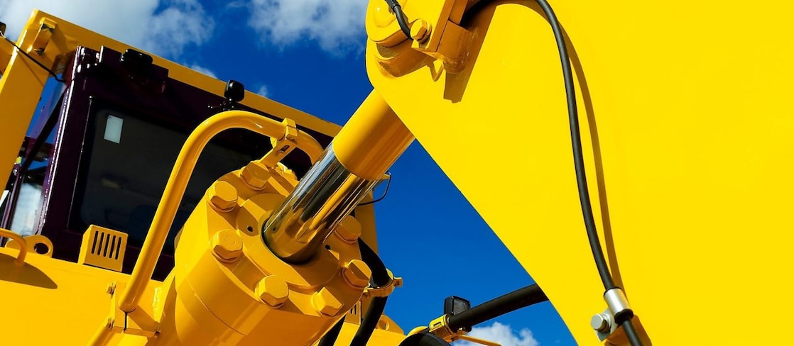 Close up on the hydraulic system of an excavator