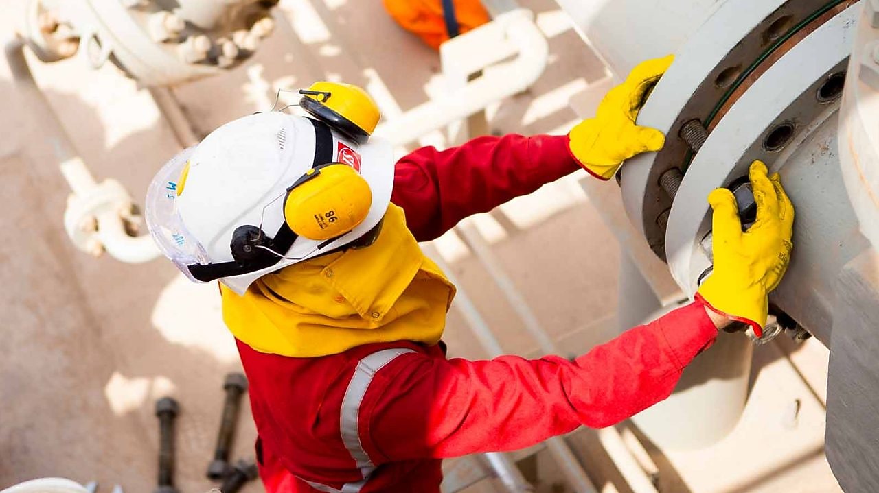 Engineer working on big pipeline