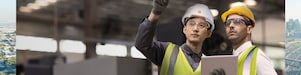 Shell worker consulting an industry worker on site