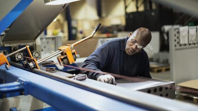 A Shell expert precisely draws a line before using machinery.