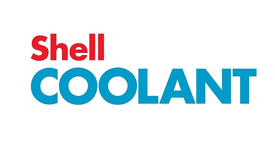 Workers in hard hats in a metal factory