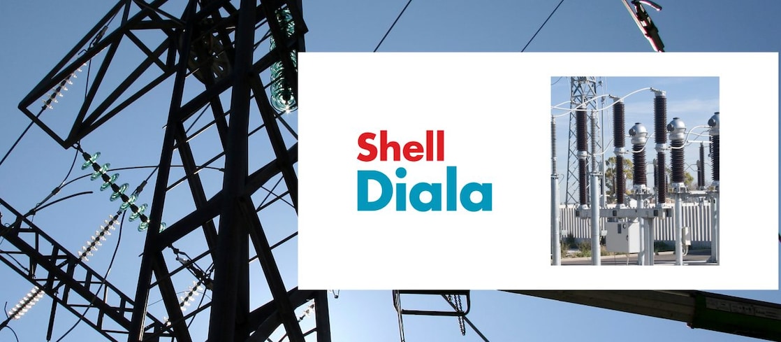Pylon with a Transformer and the Shell Diala logo over it