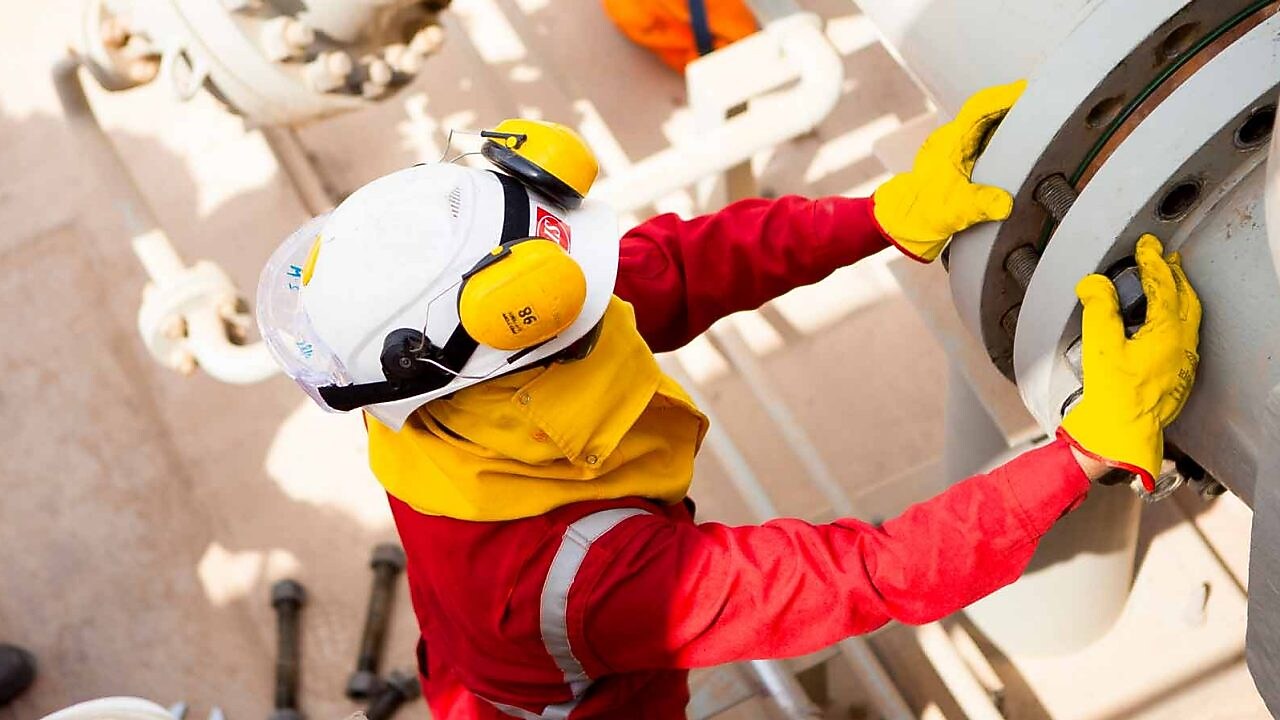 engineer working on big pipeline
