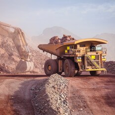 Construction truck hauling rocks