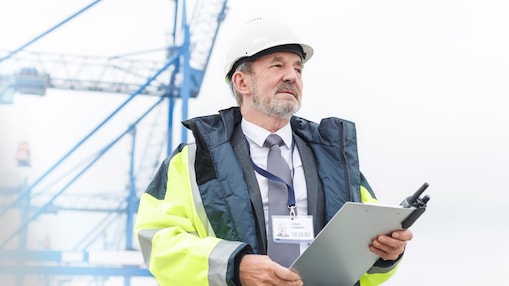 Shell employee surveying a building site