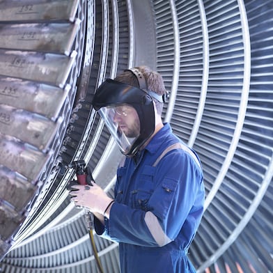 Engineer working on a turbine