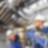 Two engineers working on a turbine