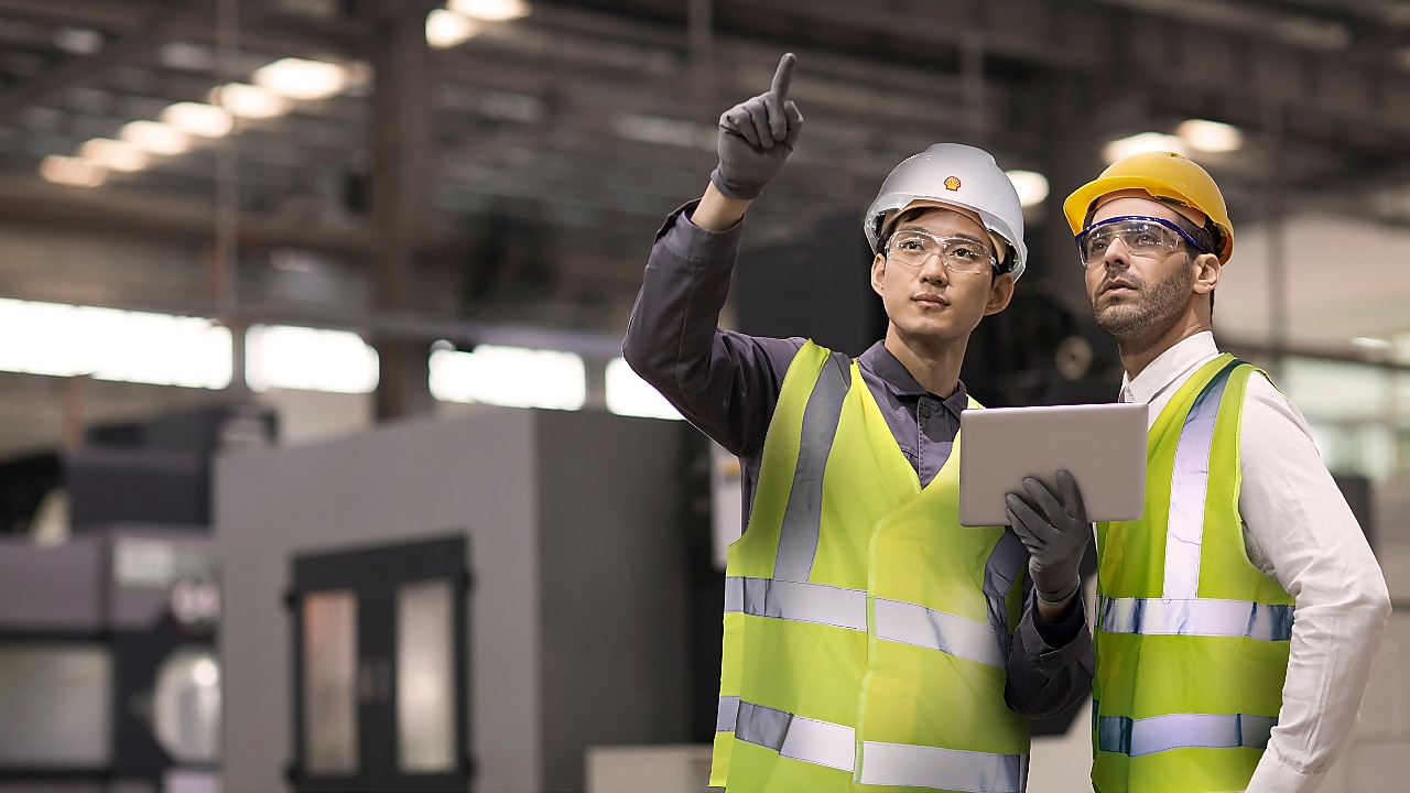 two employees talking