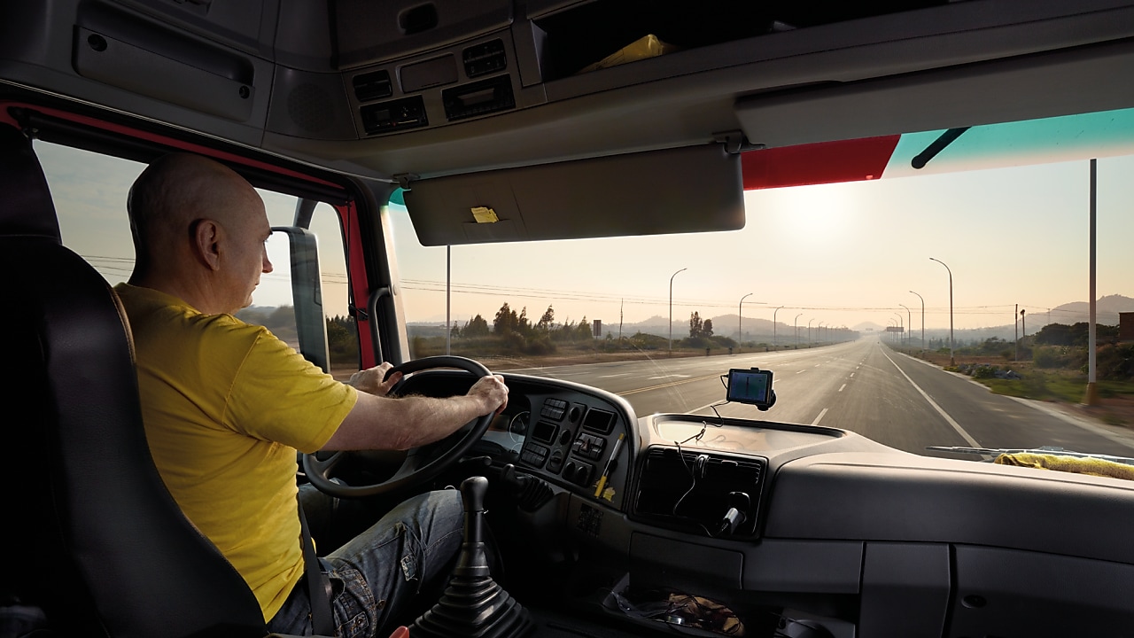truck driver driving on empty road