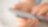 Close up of hand using smartphone over map