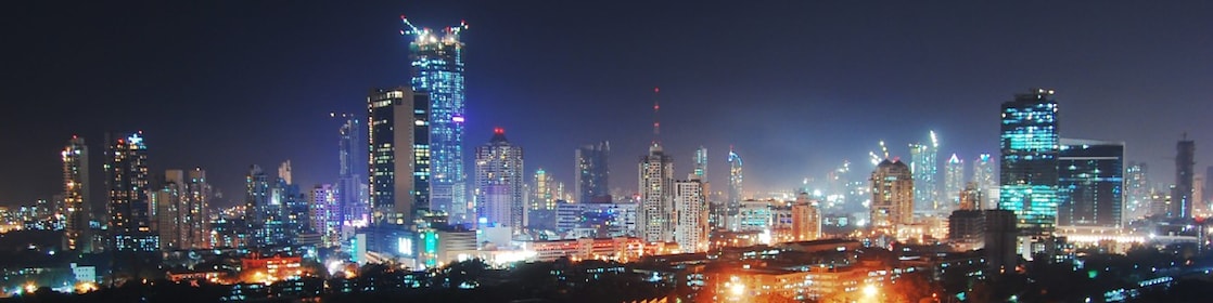 Cityscape with lights and energy in use in the city of Mumbai, India at night.