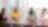 Four people sat in a conference room with a city scape background.