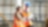 Two warehouse workers talking together over a digital tablet.
