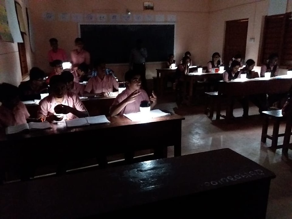 2.	Students of GHS Hosakote Somvarpete studying in classrooms using solar lamps
