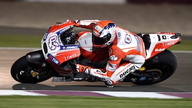 rider riding a motorbike with Shell motorcycle oil