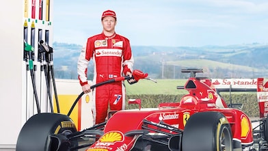 Ferrari F1 driver using Shell Helix Ultra oil to fill up car