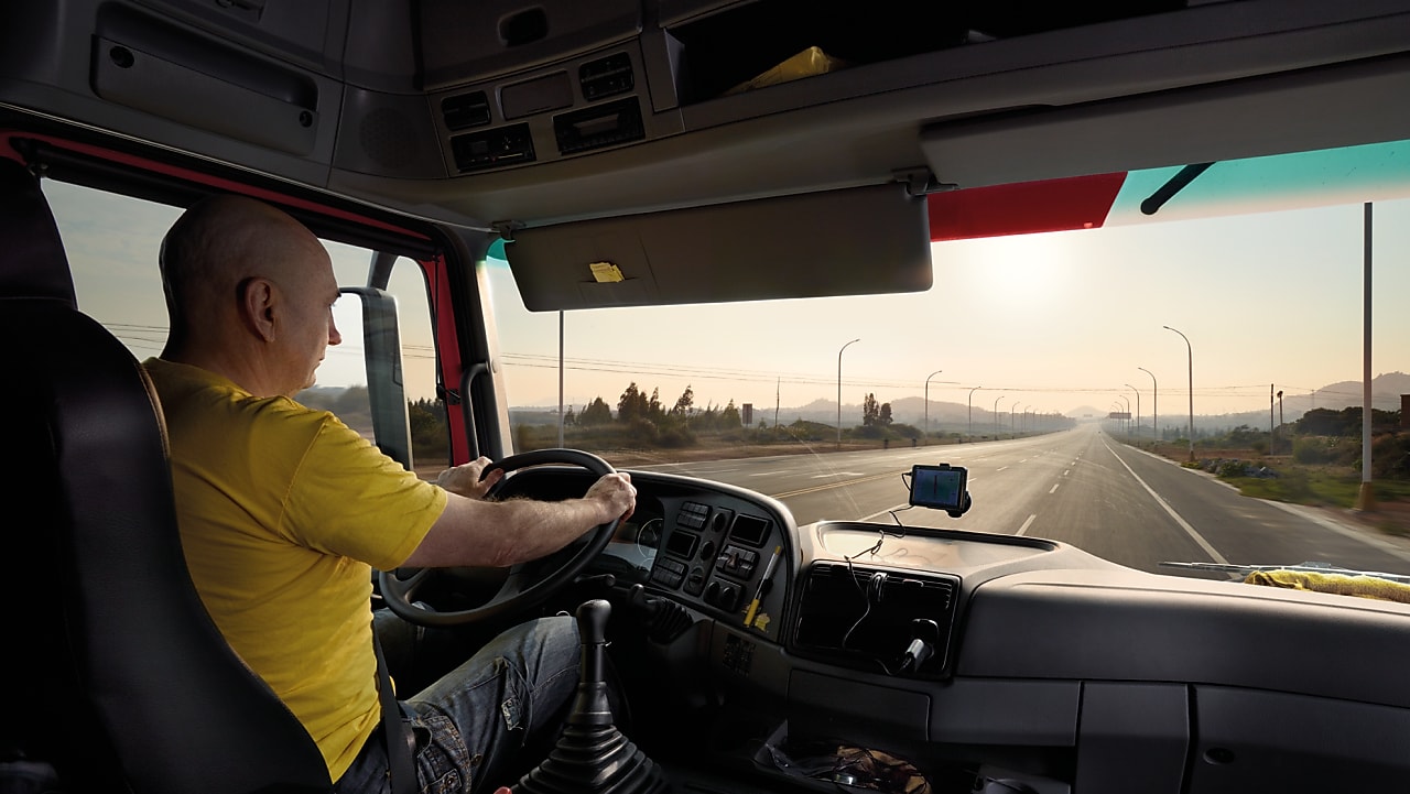truck driver driving on empty road