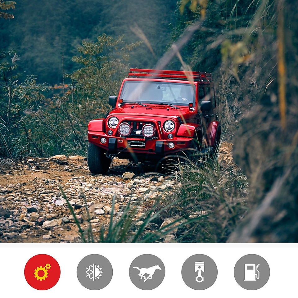 A red jeep on rugged terrain demonstrates the Shell Helix Ultra engine stress and wear protection product benefit